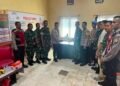 Sambangi Polsek Barru, Anggota Koramil Barru Beri Kejutan Nasi Tumpeng di HUT Bhayangkara